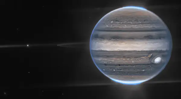 Jowisz z burzliwą atmosferą i Wielką Czerwoną Plamą. Choć trudno określić dokładną temperaturę na Jowiszu, widać, że jest to miejsce pełne dynamicznych zjawisk.