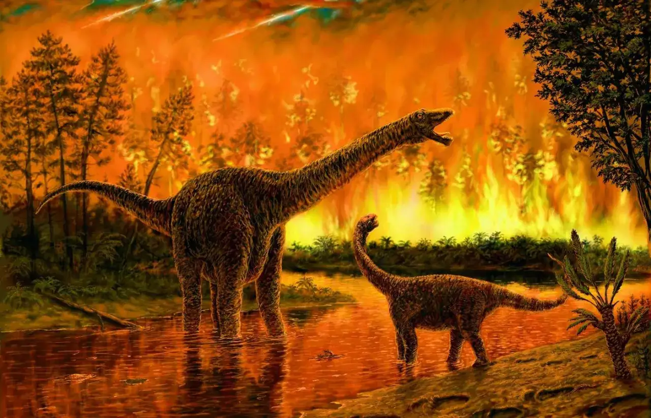 Dwa dinozaury w wodzie, otoczone płonącym lasem i spadającymi meteorytami. To wizja tego, co zabiło dinozaury.