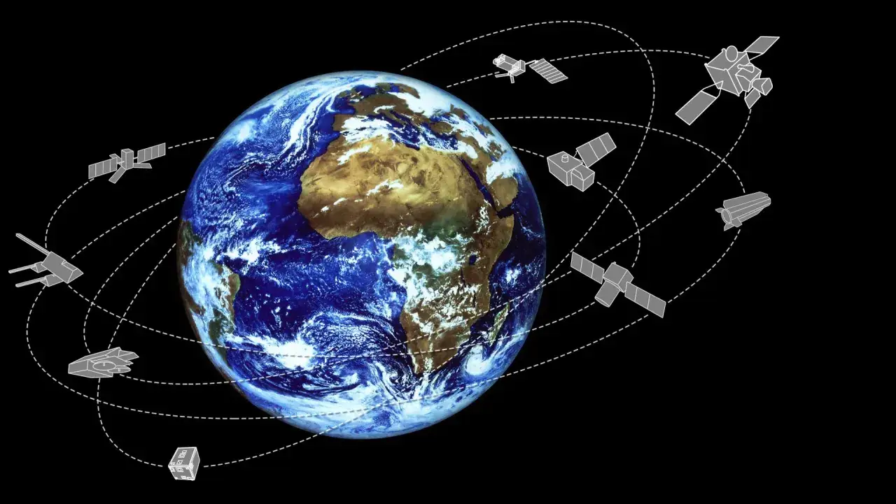 Ziemia na rozdrożu technologii. Satelity krążą wokół planety, tworząc sieć komunikacyjną i badawczą.